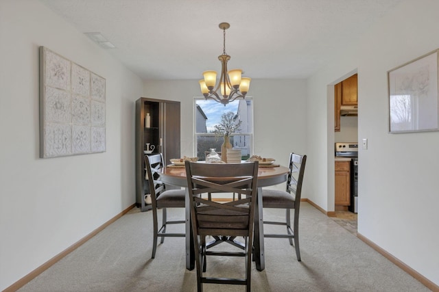 1993 Schrive Dr, Hilliard, OH 43026 - dining space with a chandelier, light carpet, and baseboards