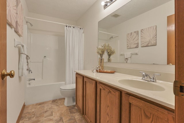 1993 Schrive Dr, Hilliard, OH 43026 - bathroom featuring toilet, shower / bathtub combination with curtain, vanity, stone finish floors, and baseboards
