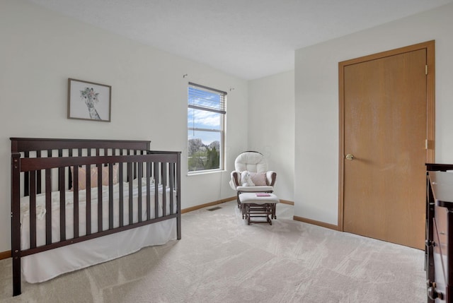 1993 Schrive Dr, Hilliard, OH 43026 - bedroom with carpet floors, baseboards, and a nursery area
