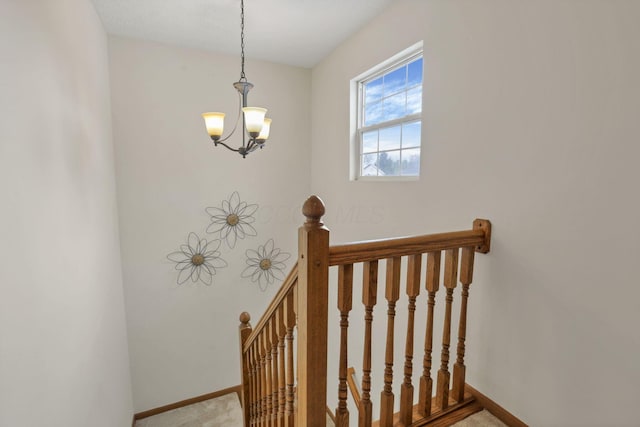1993 Schrive Dr, Hilliard, OH 43026 - stairs with baseboards, a chandelier, and carpet