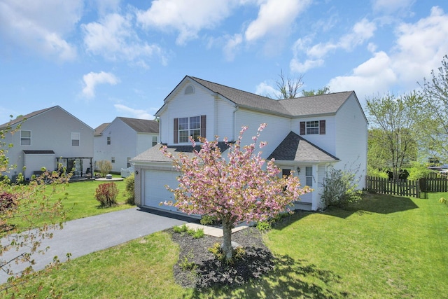 1993 Schrive Dr, Hilliard, OH 43026 - traditional-style home featuring asphalt driveway and an attached garage