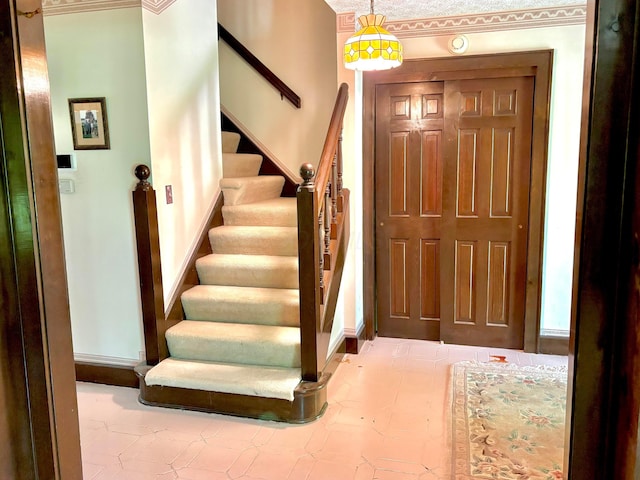 5401 Plantation Rd, Sunbury, OH 43074 - entryway with stairway, baseboards, and tile patterned floors