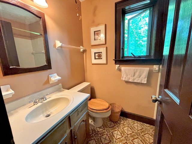 5401 Plantation Rd, Sunbury, OH 43074 - full bath with toilet, vanity, baseboards, a shower, and tile patterned floors
