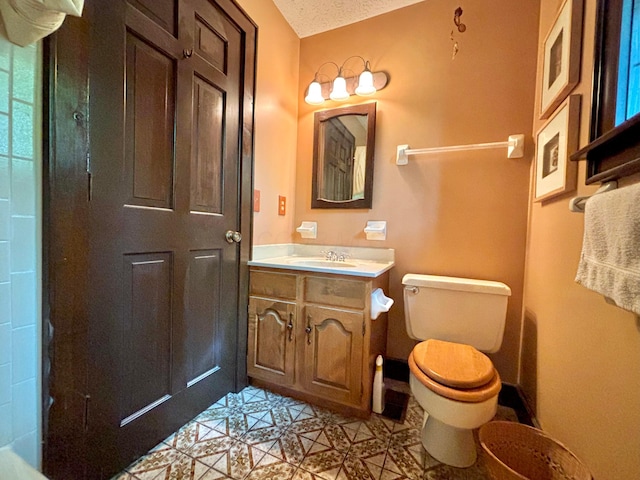 5401 Plantation Rd, Sunbury, OH 43074 - bathroom featuring toilet, vanity, tile patterned flooring, and a textured ceiling