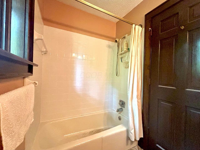 5401 Plantation Rd, Sunbury, OH 43074 - full bathroom with shower / bath combo with shower curtain and a textured ceiling