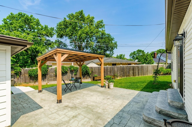 410 Acton Rd, Columbus, OH 43214 - fenced backyard with a patio and a gazebo