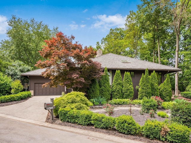 5769 Royal Lytham Ct, Dublin, OH 43017 - obstructed view of property with concrete driveway and a chimney