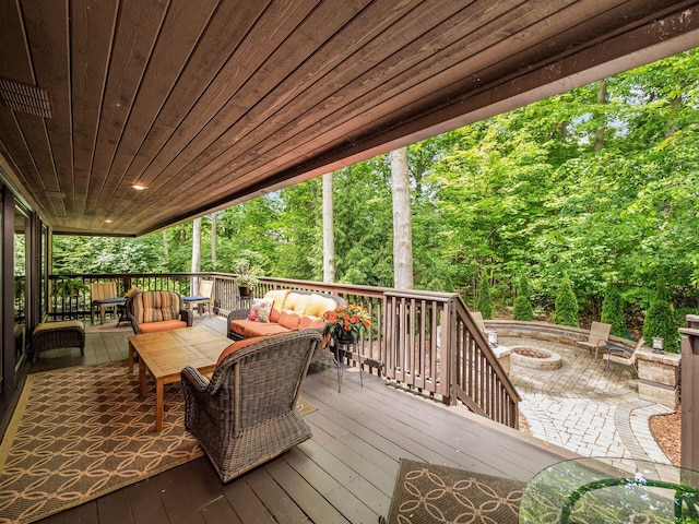 5769 Royal Lytham Ct, Dublin, OH 43017 - deck with an outdoor living space with a fire pit