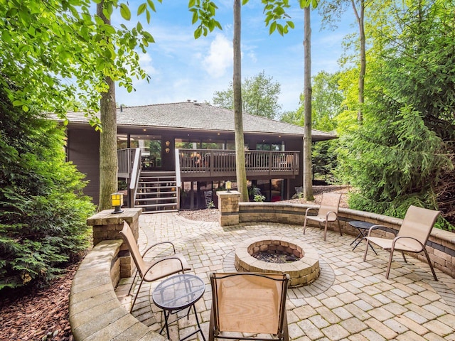 5769 Royal Lytham Ct, Dublin, OH 43017 - view of patio / terrace with a fire pit, a deck, and stairs