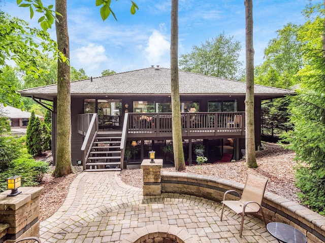 5769 Royal Lytham Ct, Dublin, OH 43017 - view of patio with stairs, a deck, and an outdoor fire pit