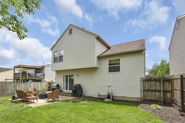 840 Gulliver Dr, Columbus, OH 43207 - back of house with a patio area and a fire pit