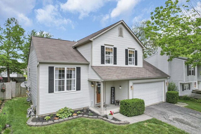 840 Gulliver Dr, Columbus, OH 43207 - view of front of home with driveway, roof with shingles, and an attached garage