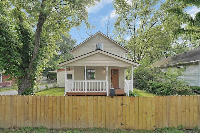 2732 Baughman Ave, Columbus, OH 43211 - view of front of home with covered porch and a fenced front yard
