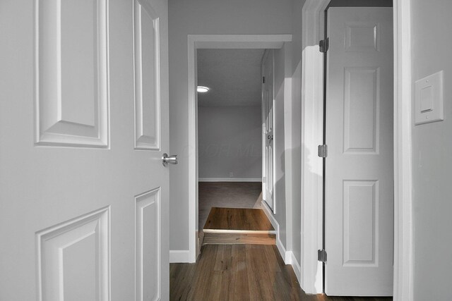 2732 Baughman Ave, Columbus, OH 43211 - hallway featuring dark wood-style flooring and baseboards