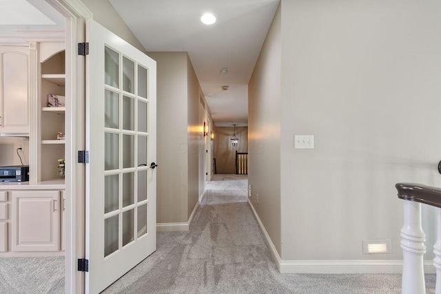 2570 Jewett Rd, Powell, OH 43065 - corridor with light carpet and baseboards