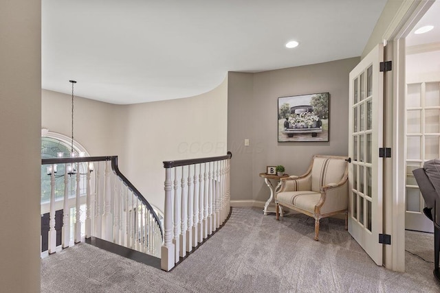 2570 Jewett Rd, Powell, OH 43065 - hallway featuring carpet floors, an upstairs landing, and recessed lighting