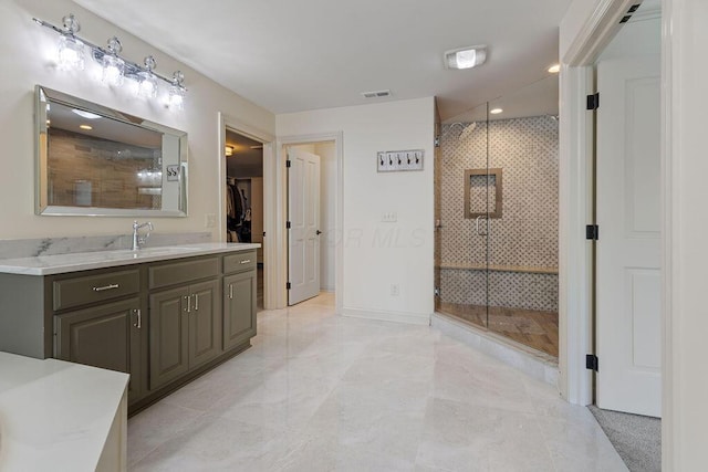 2570 Jewett Rd, Powell, OH 43065 - bathroom featuring vanity, a stall shower, a spacious closet, and recessed lighting