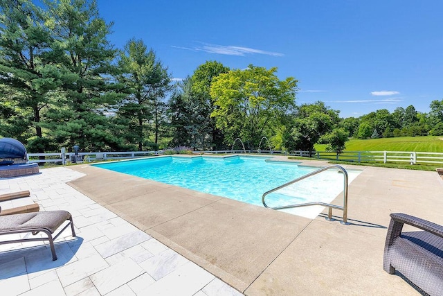 2570 Jewett Rd, Powell, OH 43065 - view of pool with a patio area and view of scattered trees