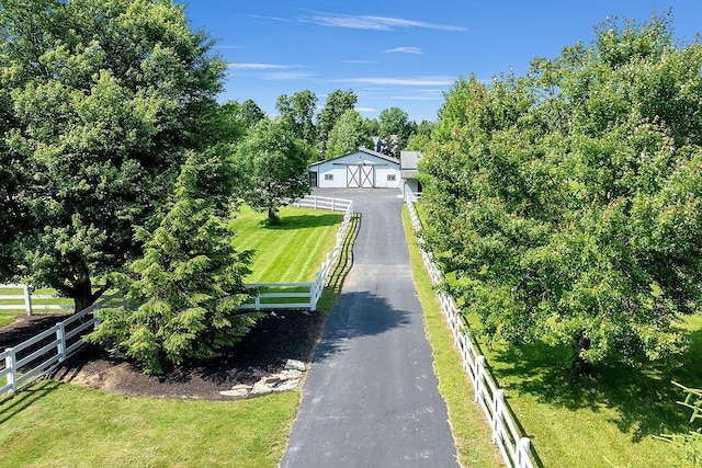 2570 Jewett Rd, Powell, OH 43065 - view of front of home with a detached garage