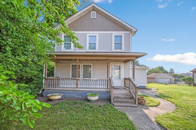 926 Harmon Ave, Columbus, OH 43223 - view of front facade featuring covered porch and a front yard