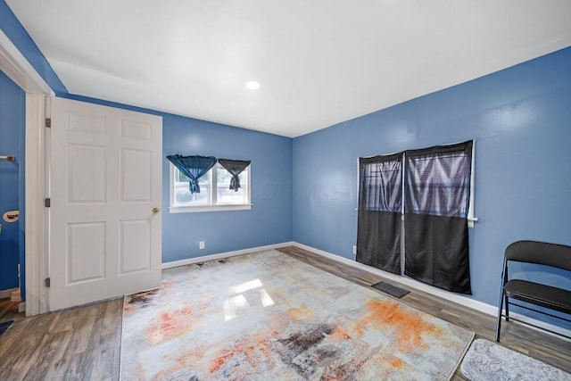 926 Harmon Ave, Columbus, OH 43223 - unfurnished bedroom featuring wood finished floors and baseboards