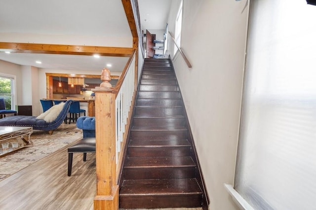 926 Harmon Ave, Columbus, OH 43223 - stairs featuring wood finished floors, beamed ceiling, and recessed lighting