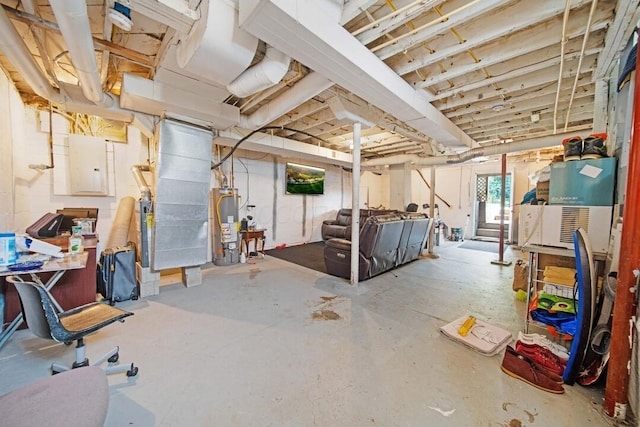 926 Harmon Ave, Columbus, OH 43223 - below grade area featuring gas water heater, heating unit, and electric panel