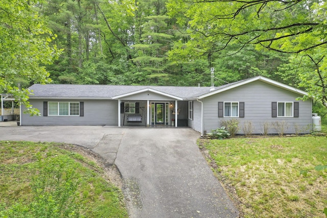 8175 Vore Ridge Rd, Athens, OH 45701 - ranch-style house with driveway and a front lawn