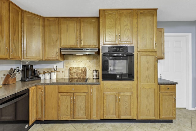 8175 Vore Ridge Rd, Athens, OH 45701 - kitchen featuring black appliances, under cabinet range hood, light tile patterned floors, backsplash, and brown cabinetry