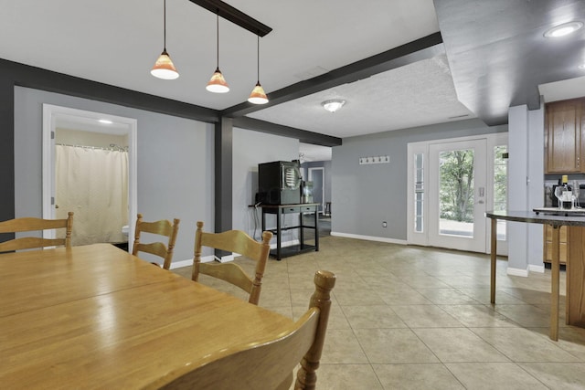 8175 Vore Ridge Rd, Athens, OH 45701 - dining space with light tile patterned floors, baseboards, and beamed ceiling