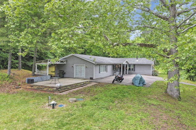 8175 Vore Ridge Rd, Athens, OH 45701 - view of front of house featuring a patio, french doors, and a front lawn