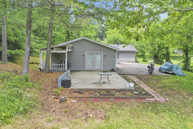 8175 Vore Ridge Rd, Athens, OH 45701 - back of house with french doors and a patio