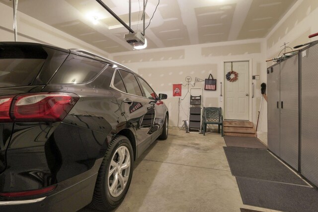 6370 Portrait Cir Unit 103, Westerville, OH 43081 - garage with a garage door opener