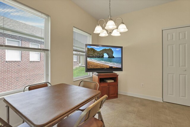 6370 Portrait Cir Unit 103, Westerville, OH 43081 - dining space featuring a chandelier and baseboards