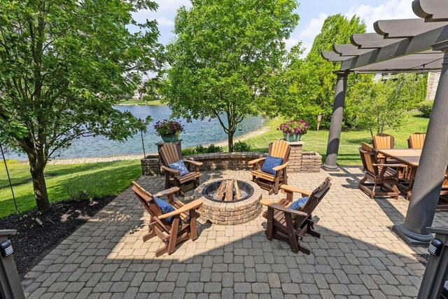 5753 Aster Way, Galena, OH 43021 - view of patio featuring an outdoor fire pit, a water view, a pergola, and outdoor dining area