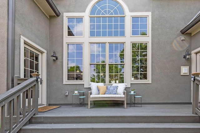 5753 Aster Way, Galena, OH 43021 - view of exterior entry featuring stucco siding and a deck