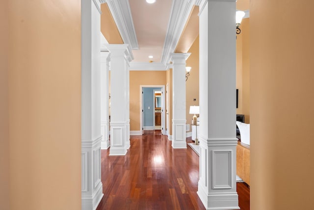 5753 Aster Way, Galena, OH 43021 - hallway with decorative columns, crown molding, and dark wood-type flooring