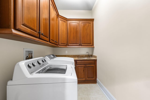 5753 Aster Way, Galena, OH 43021 - washroom with washing machine and clothes dryer, cabinet space, and baseboards