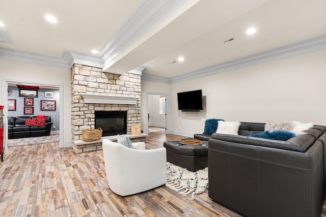 5753 Aster Way, Galena, OH 43021 - living area featuring ornamental molding, light wood-style flooring, baseboards, a fireplace, and recessed lighting