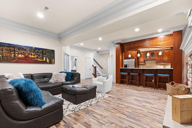 5753 Aster Way, Galena, OH 43021 - living area featuring crown molding, light wood finished floors, stairs, and recessed lighting