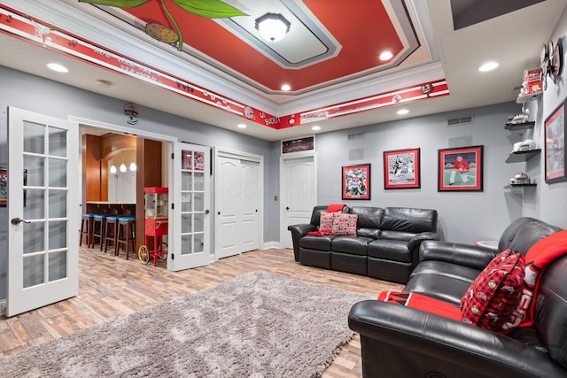 5753 Aster Way, Galena, OH 43021 - living room with french doors, a tray ceiling, recessed lighting, and wood finished floors