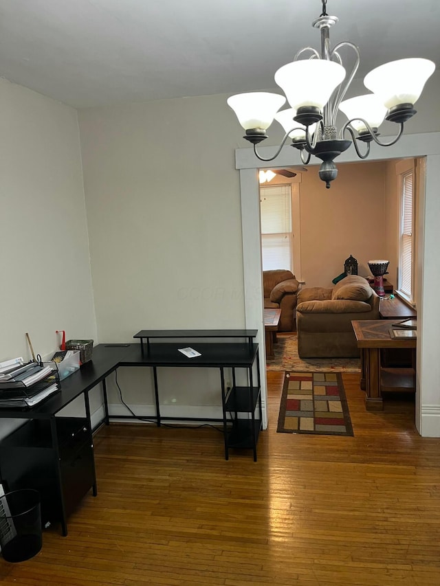 170 E Maynard Ave, Columbus, OH 43202 - dining room with hardwood / wood-style flooring and a chandelier