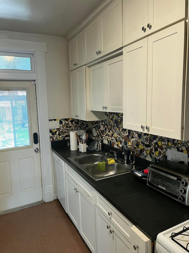 170 E Maynard Ave, Columbus, OH 43202 - kitchen featuring a sink, dishwasher, tasteful backsplash, dark countertops, and white cabinetry