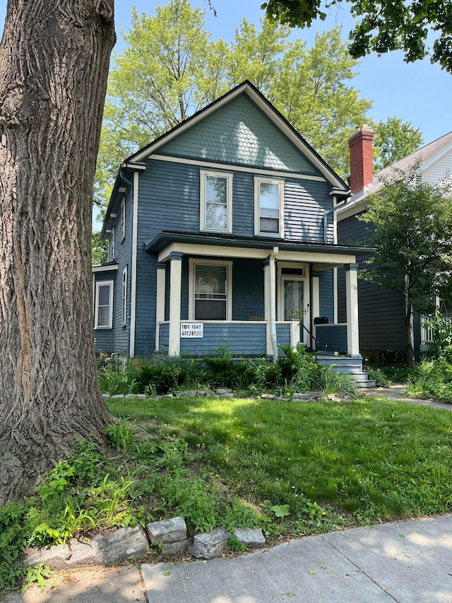 170 E Maynard Ave, Columbus, OH 43202 - victorian-style house with a porch and a front yard