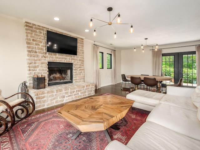 12609 Fancher Rd, Westerville, OH 43082 - living area featuring crown molding, french doors, plenty of natural light, a fireplace, and recessed lighting