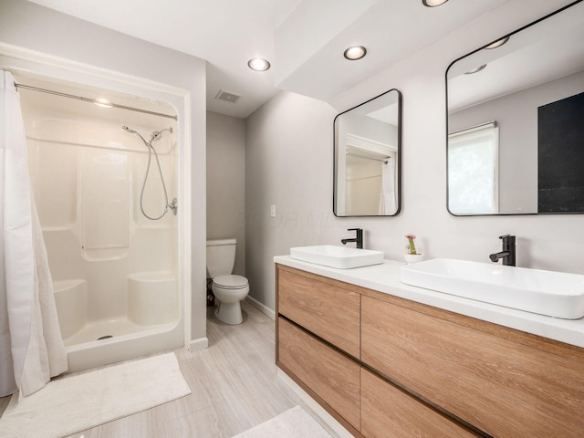 12609 Fancher Rd, Westerville, OH 43082 - bathroom featuring recessed lighting, double vanity, and curtained shower