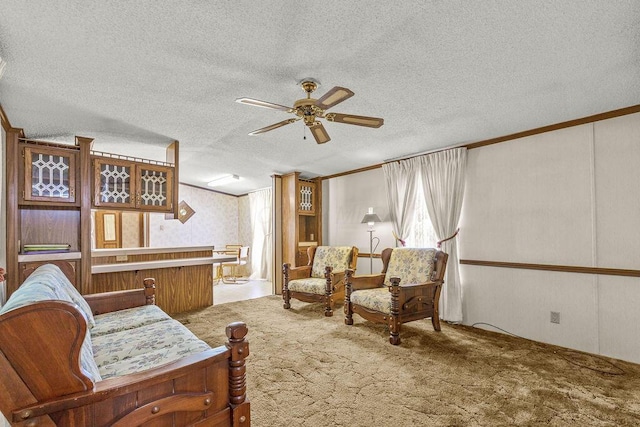 8764 National Rd SW Unit 118, Etna, OH 43062 - living area featuring carpet floors, a ceiling fan, crown molding, and a textured ceiling