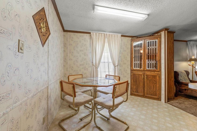 8764 National Rd SW Unit 118, Etna, OH 43062 - dining room with a textured ceiling, ornamental molding, carpet, and wallpapered walls