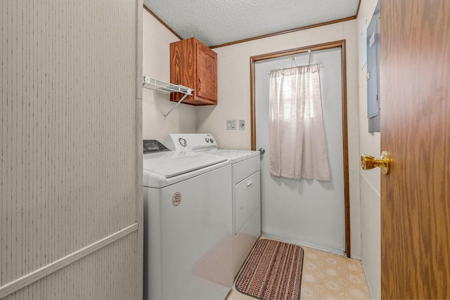 8764 National Rd SW Unit 118, Etna, OH 43062 - laundry room with washer and clothes dryer, a textured ceiling, baseboards, ornamental molding, and electric panel