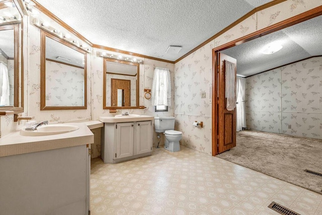 8764 National Rd SW Unit 118, Etna, OH 43062 - bathroom with crown molding, a textured ceiling, two vanities, wallpapered walls, and tile patterned floors